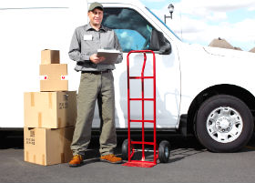 Man in front of van